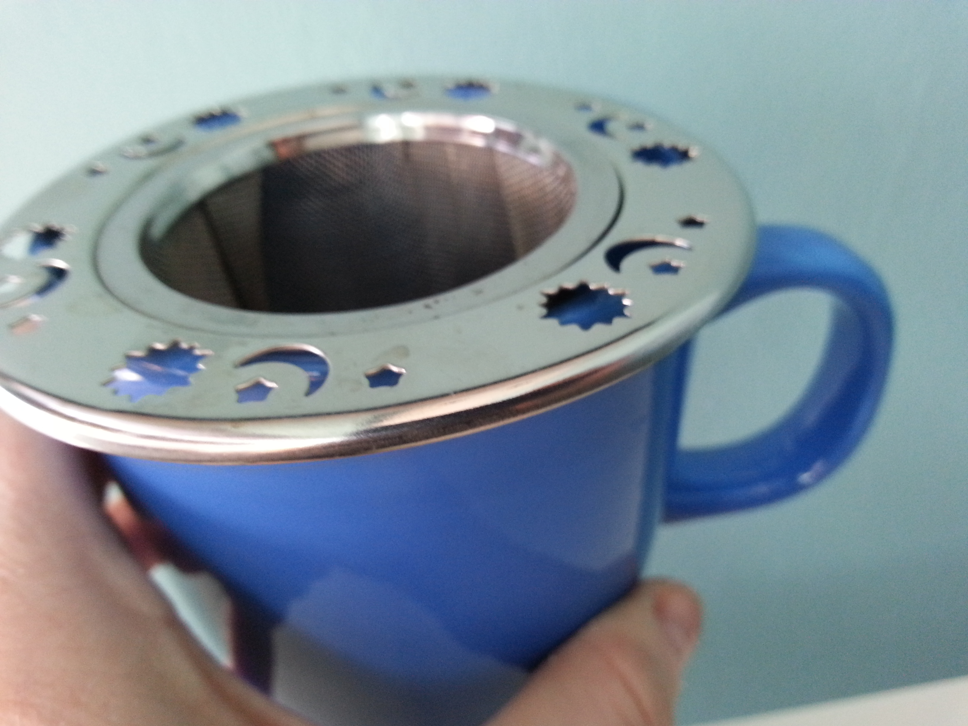 celestial tea strainer sits right inside your favorite tea cup
